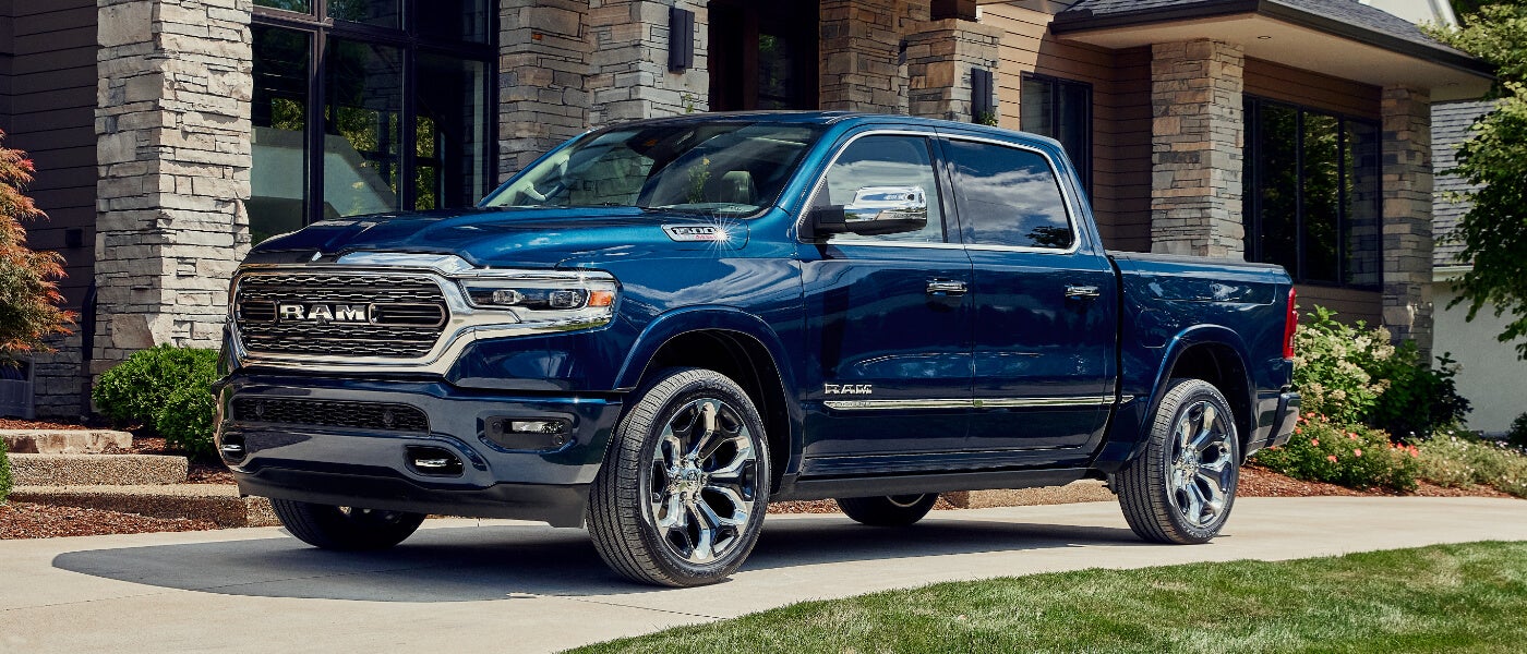 2024 Ram 1500 exterior parked near a modern home