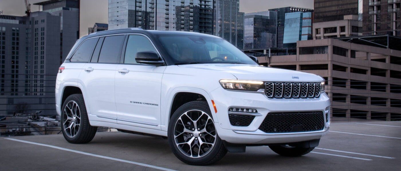 2024 Jeep Grand Cherokee inside a parking garage by a city